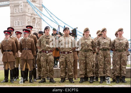 City Hall, London, UK, 23 June 2014.  Members of the British Armed Forces join the Mayor of London and London Assembly for a flag raising ceremony to honour the bravery and commitment of service personnel past and present. Credit:  Stephen Chung/Alamy Live News Stock Photo