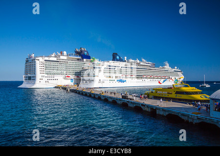 The cruise ships Norwegian Dawn and the Norwegian Epic docked at the port of Cozumel, Mexico, Caribean. Stock Photo