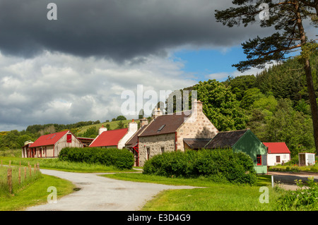 KNOCKANDO WOOL MILL ON SPEYSIDE MORAY SCOTLAND AND STORM CLOUDS IN SUMMER Stock Photo