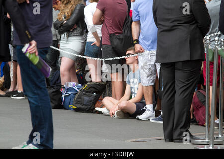 Wimbledon London,UK. 23rd June, 2014. Tennis fans start queuing on the opening day of the 2014 Wimbledon lawn tennis championships Credit:  amer ghazzal/Alamy Live News Stock Photo