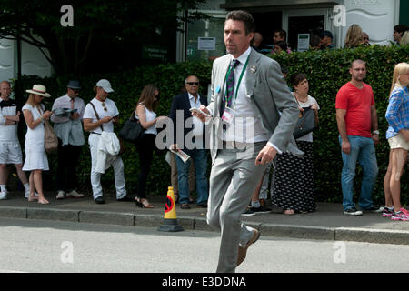 Wimbledon, London, UK. 23rd June, 2014. Former champion Michael Stich (Ger) arrives on the opening day of the 2014 lawn tennis championships in Wimbledon Credit:  amer ghazzal/Alamy Live News Stock Photo