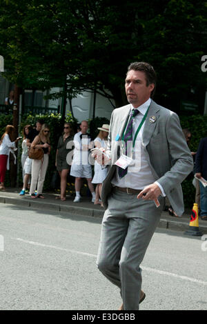 Wimbledon, London, UK. 23rd June, 2014. Former champion Michael Stich (Ger) arrives on the opening day of the 2014 lawn tennis championships in Wimbledon Credit:  amer ghazzal/Alamy Live News Stock Photo