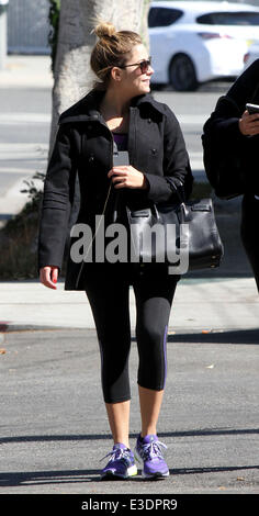 Ashley Benson, wearing a winter coat, arrives at a gym for a workout  Featuring: Ashley Benson Where: Los Angeles, California, United States When: 12 Oct 2013 Stock Photo