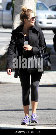 Ashley Benson, wearing a winter coat, arrives at a gym for a workout  Featuring: Ashley Benson Where: Los Angeles, California, United States When: 12 Oct 2013 Stock Photo