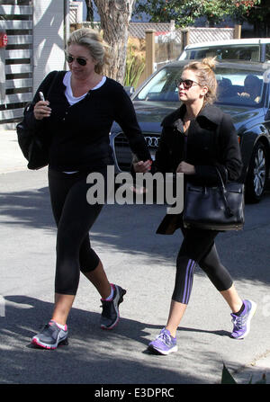 Ashley Benson, wearing a winter coat, arrives at a gym for a workout  Featuring: Ashley Benson Where: Los Angeles, California, United States When: 12 Oct 2013 Stock Photo