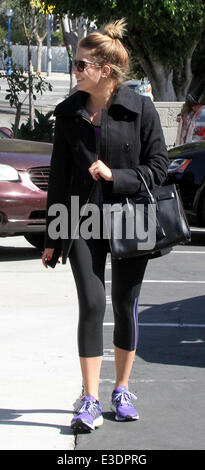 Ashley Benson, wearing a winter coat, arrives at a gym for a workout  Featuring: Ashley Benson Where: Los Angeles, California, United States When: 12 Oct 2013 Stock Photo