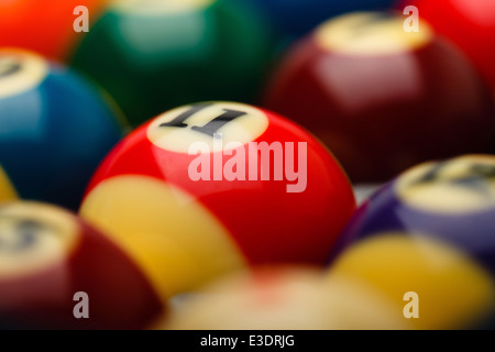 Billiard balls in box, selective focus over number 11 Stock Photo