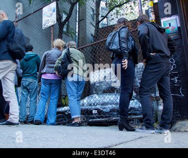 British graffiti artist Banksy gets political in his latest work in Manhattan's Lower East Side. The street artist revealed an intricate installation on Ludlow Street. Viewers said they were alarmed to hear the accompanying audio, from a 2007 raid in Bagh Stock Photo