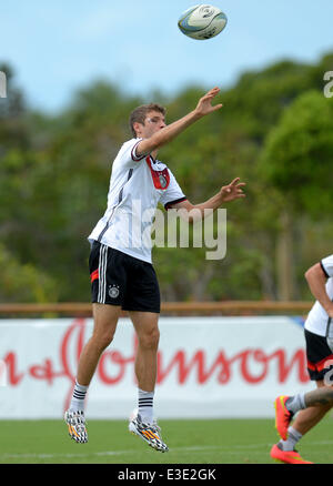 Santo Andre, Brazil. 23rd June, 2014. Thomas Mueller in action during a rugby warm-up game during a training session of the German national soccer team at the training center in Santo Andre, Brazil, 23 June 2014. The FIFA World Cup 2014 will take place in Brazil from 12 June to 13 July 2014. Photo: Thomas Eisenhuth/dpa/Alamy Live News Stock Photo