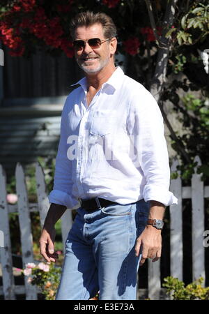 Pierce Brosnan is all smiles while walking around on the set of his new movie 'How To Make Love Like An Englishman' filming in Dowtown Los Angeles  Featuring: Pierce Brosnan Where: Los Angeles, CA, United States When: 16 Oct 2013 Stock Photo