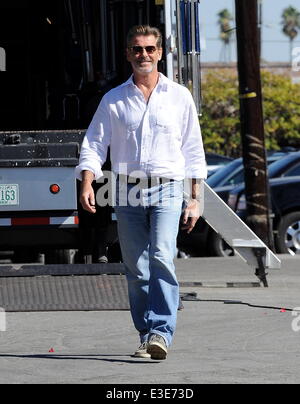 Pierce Brosnan is all smiles while walking around on the set of his new movie 'How To Make Love Like An Englishman' filming in Dowtown Los Angeles  Featuring: Pierce Brosnan Where: Los Angeles, CA, United States When: 16 Oct 2013 Stock Photo