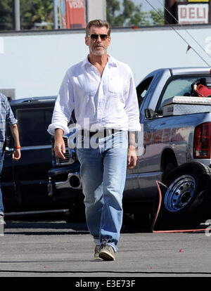 Pierce Brosnan is all smiles while walking around on the set of his new movie 'How To Make Love Like An Englishman' filming in Dowtown Los Angeles  Featuring: Pierce Brosnan Where: Los Angeles, CA, United States When: 16 Oct 2013 Stock Photo