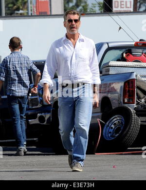 Pierce Brosnan is all smiles while walking around on the set of his new movie 'How To Make Love Like An Englishman' filming in Dowtown Los Angeles  Featuring: Pierce Brosnan Where: Los Angeles, CA, United States When: 16 Oct 2013 Stock Photo