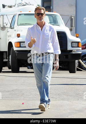 Pierce Brosnan is all smiles while walking around on the set of his new movie 'How To Make Love Like An Englishman' filming in Dowtown Los Angeles  Featuring: Pierce Brosnan Where: Los Angeles, CA, United States When: 16 Oct 2013 Stock Photo