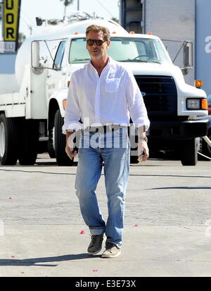 Pierce Brosnan is all smiles while walking around on the set of his new movie 'How To Make Love Like An Englishman' filming in Dowtown Los Angeles  Featuring: Pierce Brosnan Where: Los Angeles, CA, United States When: 16 Oct 2013 Stock Photo