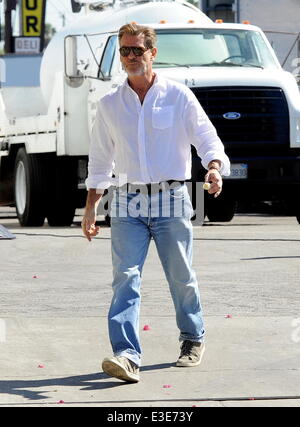 Pierce Brosnan is all smiles while walking around on the set of his new movie 'How To Make Love Like An Englishman' filming in Dowtown Los Angeles  Featuring: Pierce Brosnan Where: Los Angeles, CA, United States When: 16 Oct 2013 Stock Photo