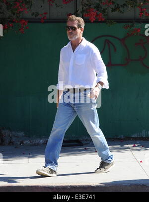 Pierce Brosnan is all smiles while walking around on the set of his new movie 'How To Make Love Like An Englishman' filming in Dowtown Los Angeles  Featuring: Pierce Brosnan Where: Los Angeles, CA, United States When: 16 Oct 2013 Stock Photo