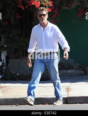 Pierce Brosnan is all smiles while walking around on the set of his new movie 'How To Make Love Like An Englishman' filming in Dowtown Los Angeles  Featuring: Pierce Brosnan Where: Los Angeles, CA, United States When: 16 Oct 2013 Stock Photo