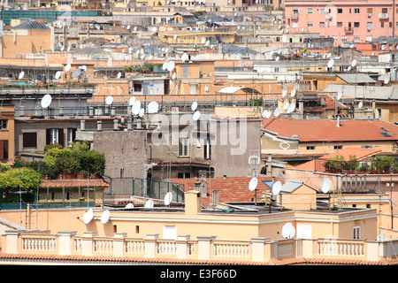 Satellite dishes on rooftop Stock Photo