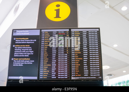 Airport departures board Stock Photo