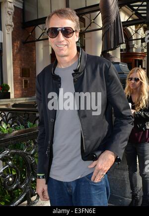 Pro Skateboarder Tony Hawk & girlfriend Cathy Goodman spotted walking with coffees at The Shelbourne Hotel...  Featuring: Tony Hawk Where: Dublin, Ireland When: 01 Nov 2013 Stock Photo