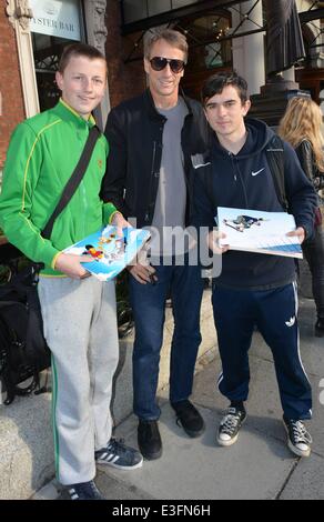 Pro Skateboarder Tony Hawk & girlfriend Cathy Goodman spotted walking with coffees at The Shelbourne Hotel...  Featuring: Tony Hawk,David Moynan,Conor Murphy Where: Dublin, Ireland When: 01 Nov 2013 Stock Photo