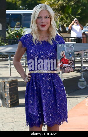 Tori Spelling seen at Universal Studios where she is interviewed by Mario Lopez for entertainment show Extra.  Featuring: Tori Spelling Where: Los Angeles, California, United States When: 06 Nov 2013 Stock Photo