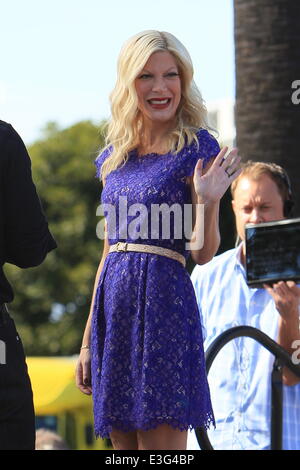 Tori Spelling seen at Universal Studios where she is interviewed by Mario Lopez for entertainment show Extra.  Featuring: Tori Spelling Where: Los Angeles, California, United States When: 06 Nov 2013 Stock Photo