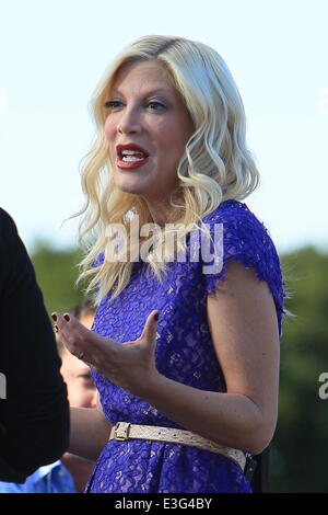 Tori Spelling seen at Universal Studios where she is interviewed by Mario Lopez for entertainment show Extra.  Featuring: Tori Spelling Where: Los Angeles, California, United States When: 06 Nov 2013 Stock Photo