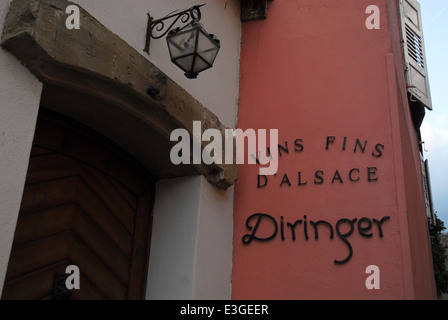 Wine cellar sign on a house wall in Alsace, France Stock Photo