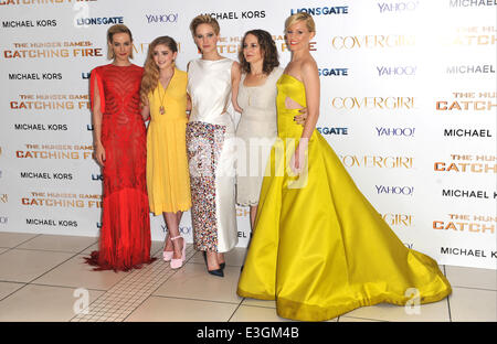 World Premiere of 'The Hunger Games: Catching Fire' at the Odeon Leicester Square London Featuring: Jen Malone,Olivia Shield,Nina Jacobsen,Jennifer Lawrence,and Elizabeth Banks Where: London United Kingdom When: 11 Nov 2013 Stock Photo