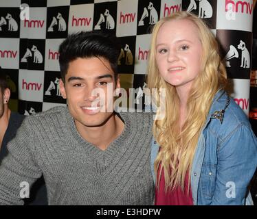 The Wanted sign their new album 'Word of Mouth' at HMV Dundrum...  Featuring: The Wanted - Siva Kaneswaran & fan Aoife McDonnell Where: Dublin, Ireland When: 19 Nov 2013 Stock Photo