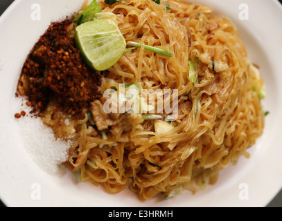 Stir fried rice noodle on plate (Korat’s stir fried noodle) Stock Photo