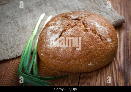 Composition with salami sausages with fresh country bread .farm-style Stock Photo
