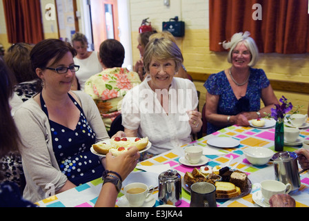 Cream Tea in the village hall after the Nether Stowey Female Friendly Society, Womens Club Walk Day, an annual event. Nether Stowey, Somerset UK June 2014  2010s HOMER SYKES Stock Photo