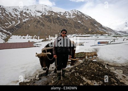 A villager at the village of Ushguli one of the highest continuously inhabited settlements in Europe located at the head of the Enguri gorge in Svaneti, recognized as the Upper Svaneti UNESCO World Heritage Site in the Republic of Georgia Stock Photo