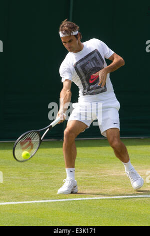 Wimbledon, London, UK. 24th June, 2014.  Picture shows Roger Federer (SUI) on day two of Wimbledon Tennis Championships 2014 warming up before his 1st round match with Paolo Lorenzi (ITA) on No.1 Court. Credit:  Clickpics/Alamy Live News Stock Photo