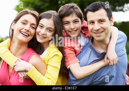 Portrait Of Hispanic Family In Countryside Stock Photo