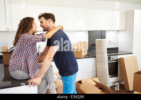 Couple Taking A Break During House Move Stock Photo