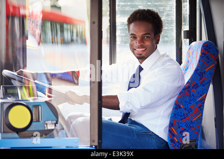 Portrait Of Bus Driver Behind Wheel Stock Photo