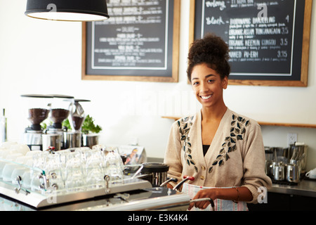 Female Owner Of Coffee Shop Stock Photo