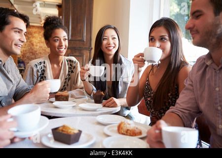 Group Of Friends Meeting In Café Restaurant Stock Photo