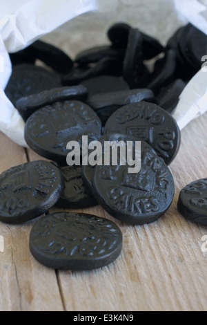 Pontefract Cakes a licorice sweet from Yorkshire stamped with the castle lodge emblem a traditional design dated to 1612 Stock Photo