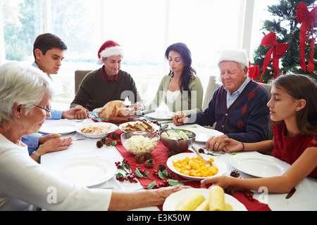 View Of Senior Man Using Laptop Through Window Stock Photo