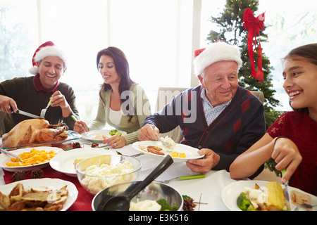 View Of Senior Man Using Laptop Through Window Stock Photo