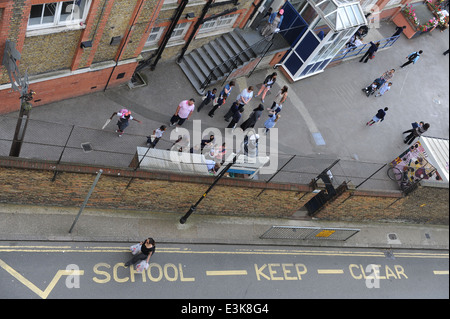 school children arriving for school on first day of new september term. Stock Photo