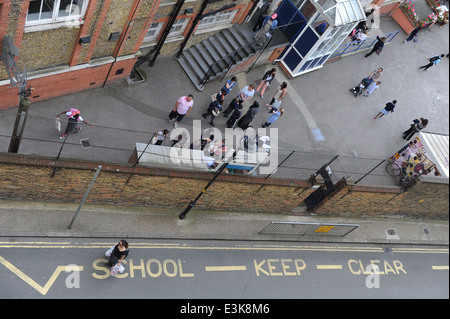 school children arriving for school on first day of new september term. Stock Photo