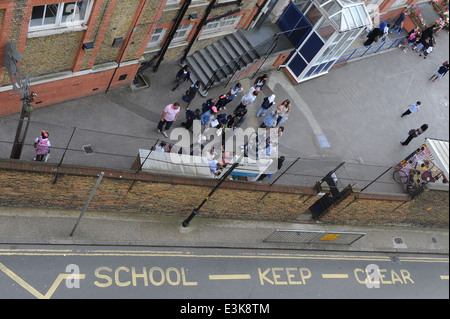 school children arriving for school on first day of new september term. Stock Photo