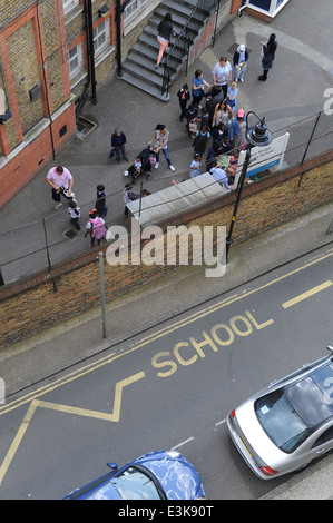 school children arriving for school on first day of new september term. Stock Photo