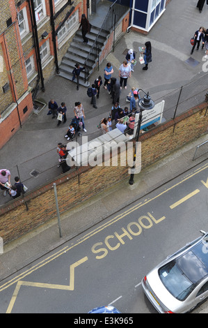 school children arriving for school on first day of new september term. Stock Photo